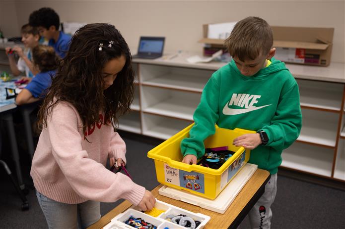  Students work during a Lego practice team 