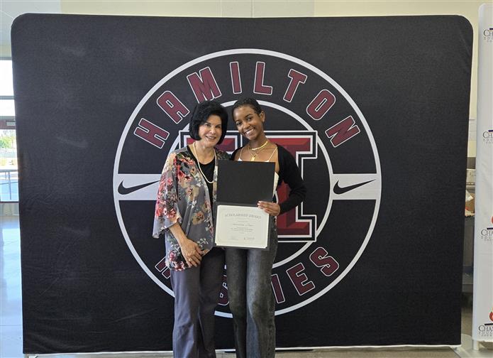 Dr. Camille Casteel, former CUSD Superintendent presents award to Hamilton High scholarship recipient Sheridan Jones. 