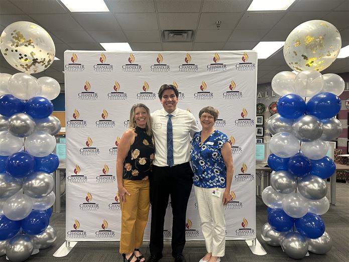Jen Hewitt, Executive Director of the Chandler Education Foundation, Chase Winkleman, 2023 Chandler grad, and Barb Mozdzen.