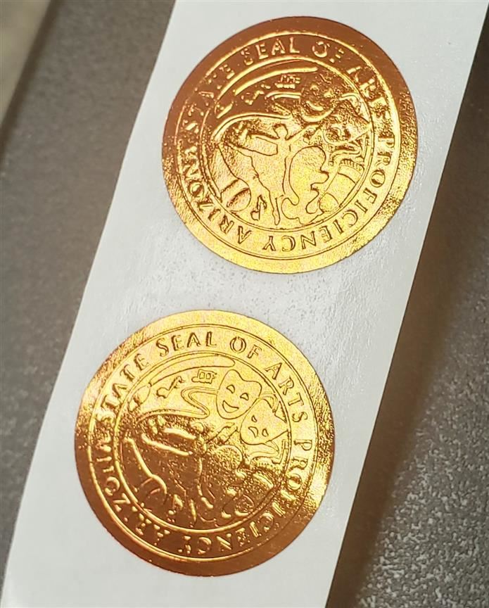  An image of the fine arts seals that go on students' diplomas at graduation