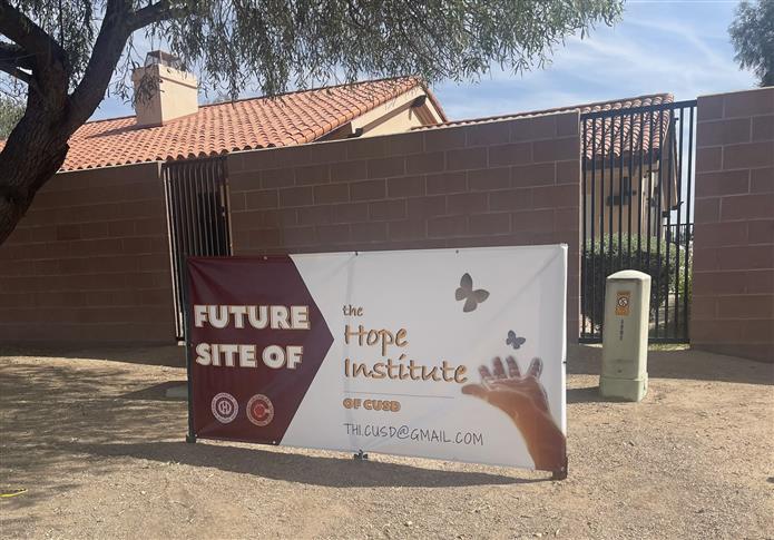 An image of a banner at the future site of the Hope Institute of CUSD