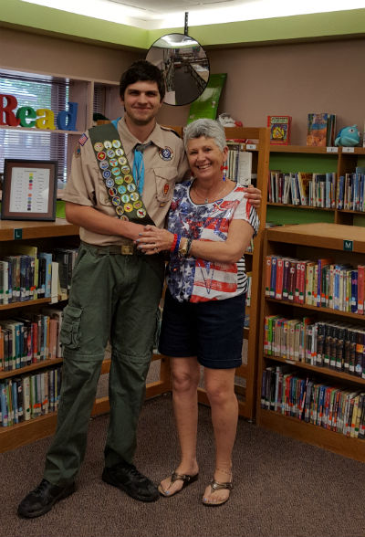 Matthew Rose with retired CTA Goodman principal, Maureen Sniff