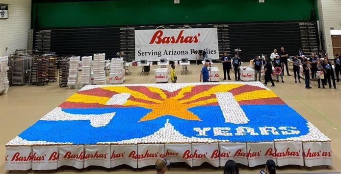  Image of Bashas' 90th anniversary logo. B with AZ state flag colored in (doughnut mosaic).