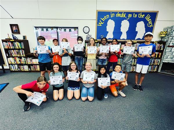 5th and 6th graders at Jacobson Elemenary met once a week and read 12 books over the year. The team with the top score at Jacobson moved onto the district semi-finals in May 2022.