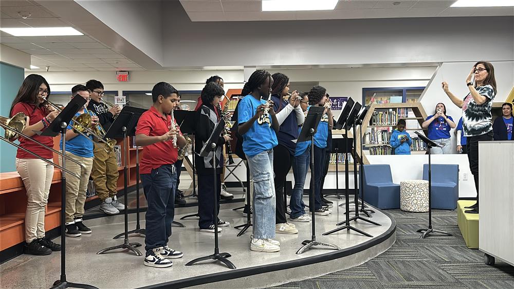 An image of the Frye Elementary School band students performing at the ribbon cutting ceremony.